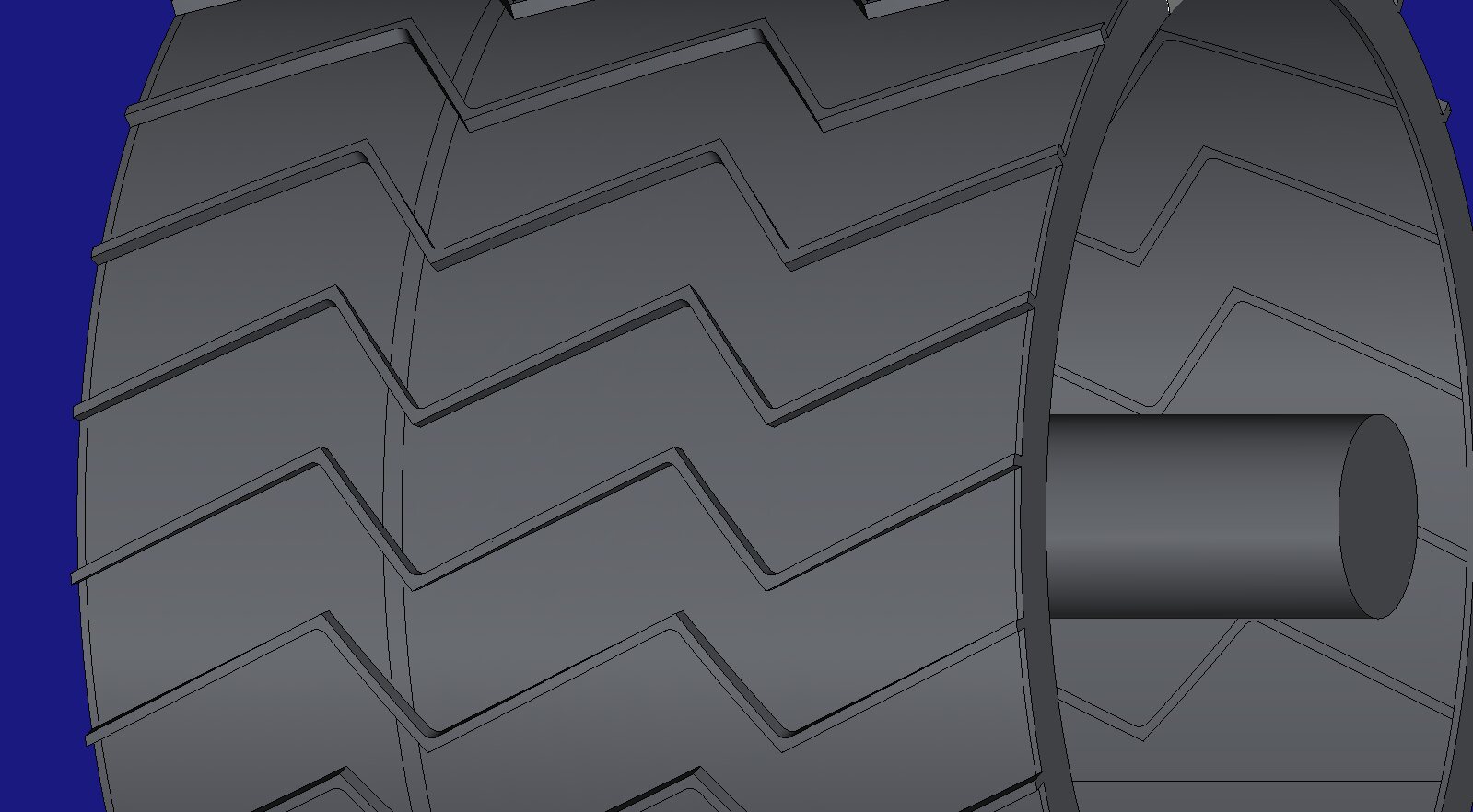 HiNC's view of the agent's wheel model with the machine hidden: chevron grousers across the tread, the rim at the wheel's end, the mandrel through the middle, and a fine double line round the tread over the stiffening ring