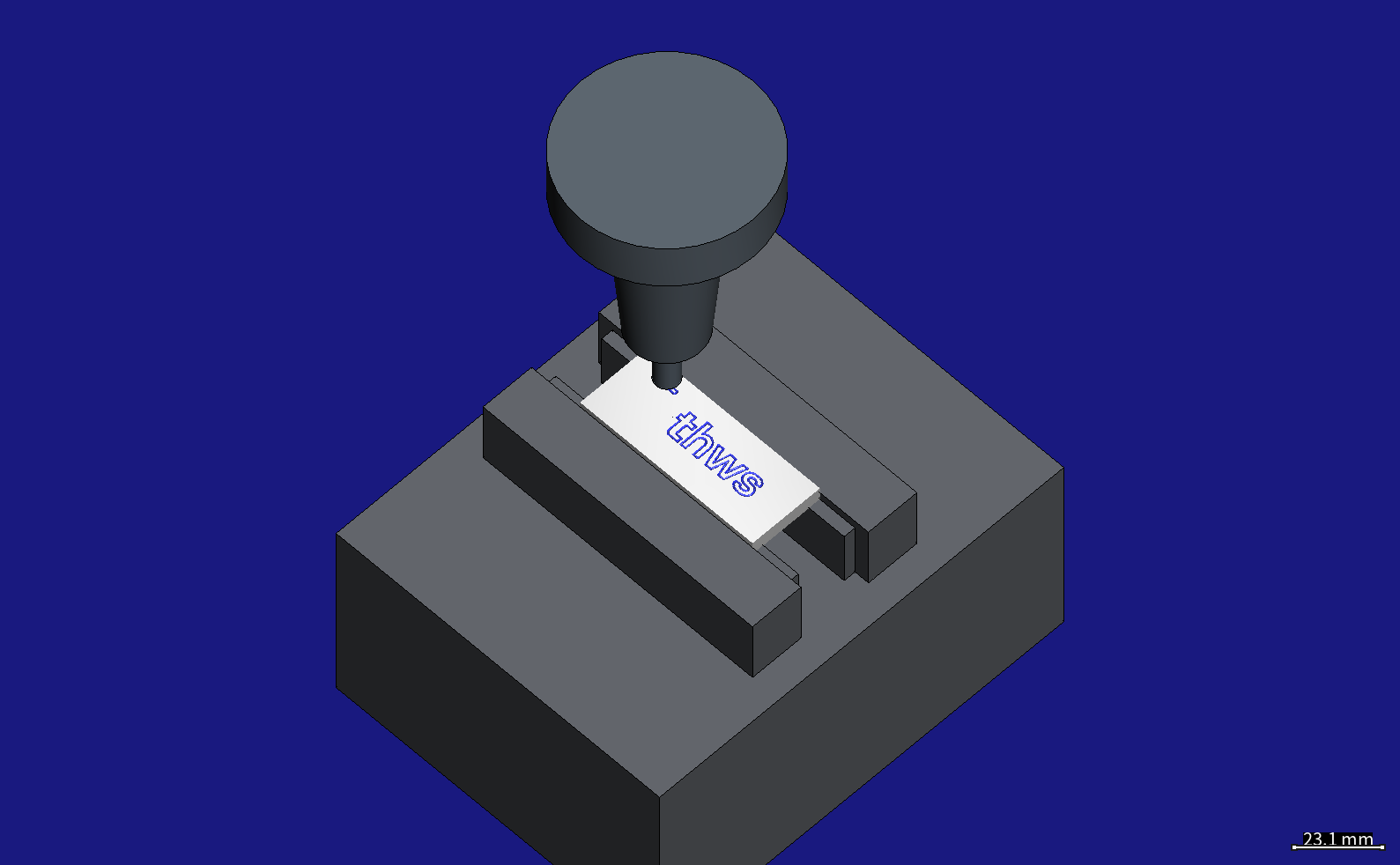 The simulated engraving: the Ø8 chamfer mill in its shrink-fit holder over the plate, held in a machine vise; “thws” is already engraved