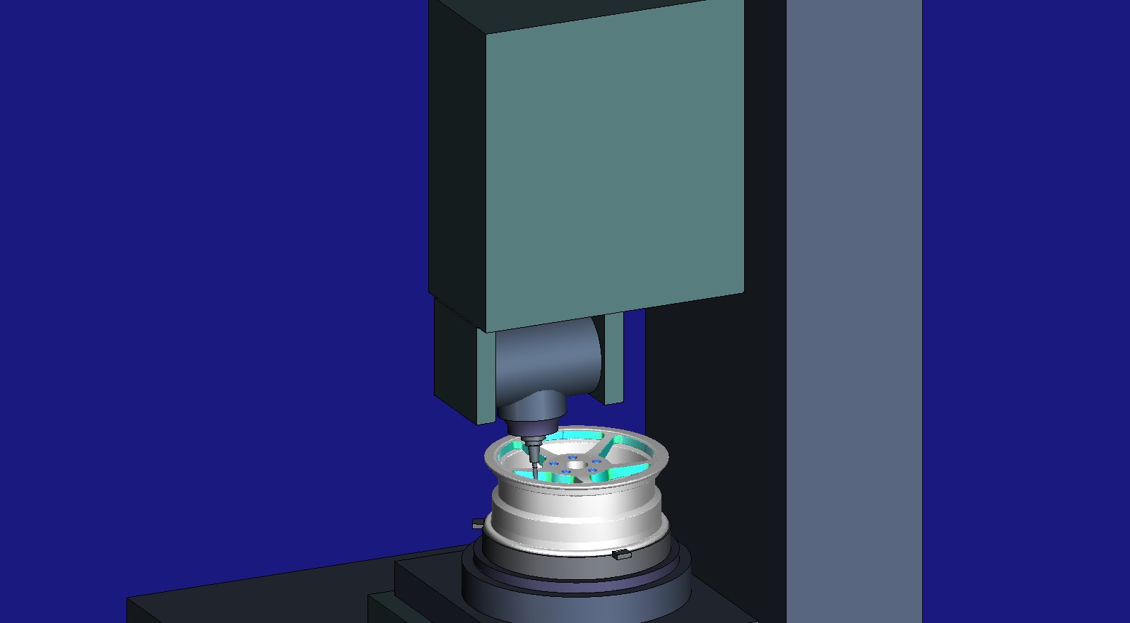HiNC simulation of the generic table-C / swivel-head-B machine: the fork, the B trunnion, the spindle housing and nose, the tool inside a window of the wheel, which sits face up on its support ring and jaws on the C table