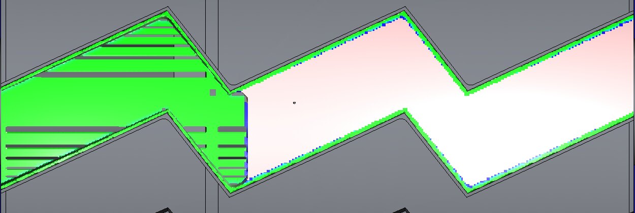 The same comparison on the trimmed program at a 1 mm grid: bands of grey across the green where the skin is missing, the part not yet cut white