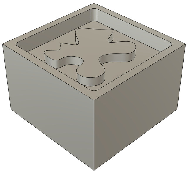 The data set's rendering of part 7: a square pocket with a wavy, spline-outlined island standing in it