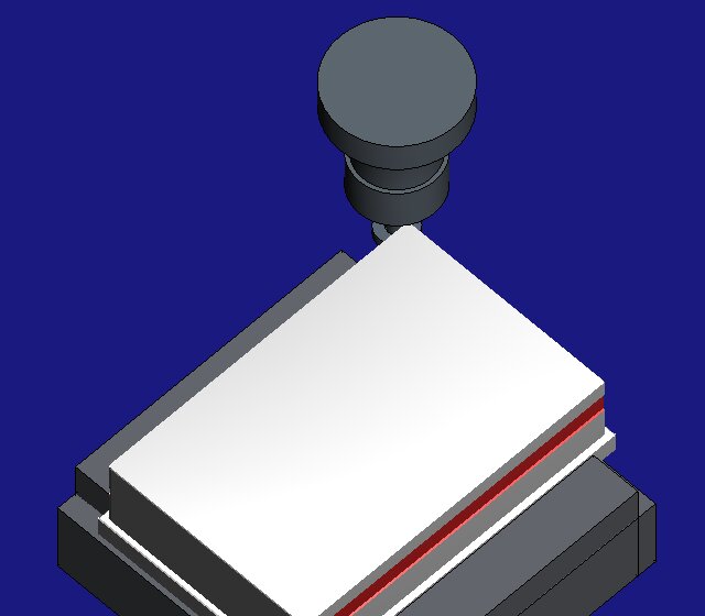 HiNC: the T-slot cutter's chuck at the far end of the bottom shell's blank, the outer groove cut along the wall in red while the cavity is still uncut, the blank in a vice