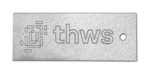 The real keychain as the data set's authors photographed it: a plate with the THWS logo and the word thws engraved, and a small hole at its right end