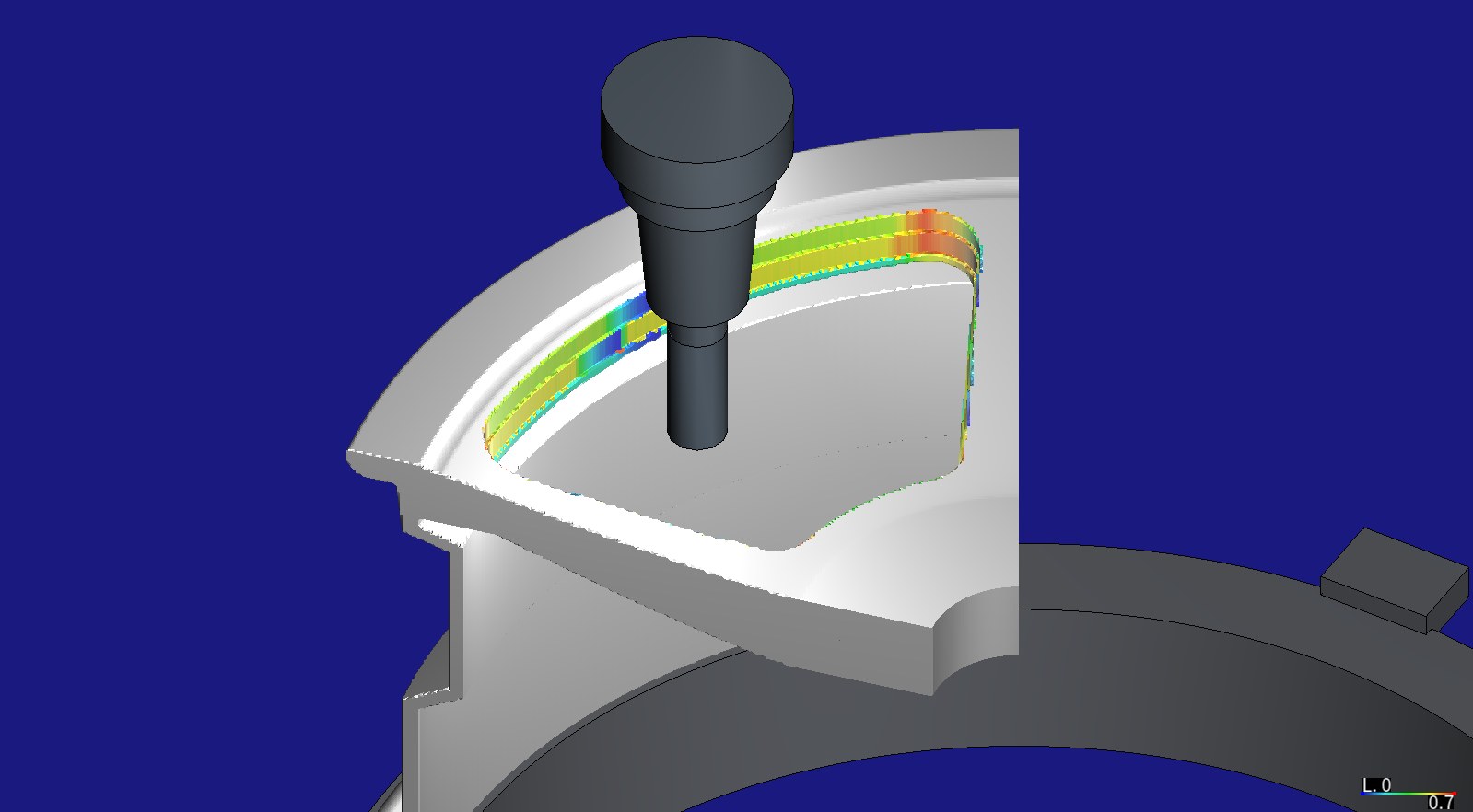 The wheel in HiNC after the feed optimization: a 20 mm end mill in its shrink-fit holder above one window the optimized roughing program has cut, the window walls coloured by spindle power, yellow to red and highest at the corner